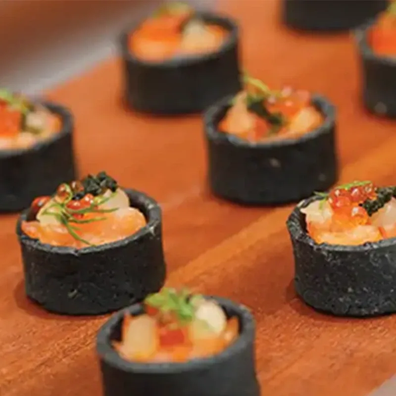Charcoal tart canapés